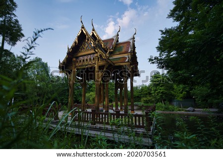The Munich Westpark Pagoda with trees on the background
