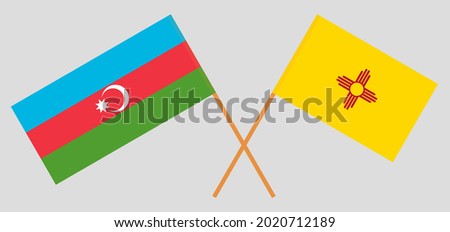 Crossed flags of Azerbaijan and the State of New Mexico. Official colors. Correct proportion