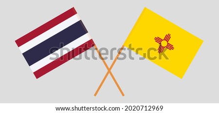 Crossed flags of Thailand and the State of New Mexico. Official colors. Correct proportion