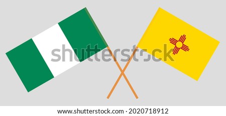 Crossed flags of Nigeria and the State of New Mexico. Official colors. Correct proportion