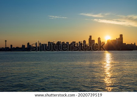 Sunrise On Elliott Bay And The Seattle Waterfront  Royalty-Free Stock Photo #2020739519