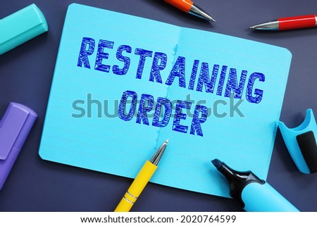 Financial concept about Restraining Order with phrase on the sheet. 
 Royalty-Free Stock Photo #2020764599