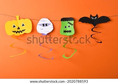 Garland of Halloween characters. Stretch out on the ropes of pumpkin, zombie, bat and frankenstein.