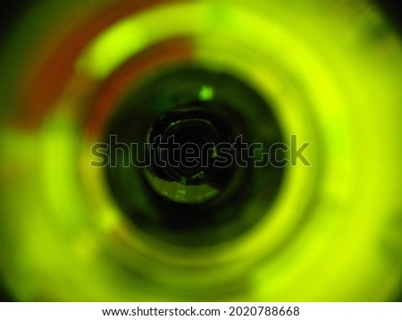 Kryptonite - Abstract close-up photograph of the inside of a green bottle.  Royalty-Free Stock Photo #2020788668