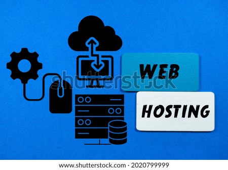 Business concept.Text WEB HOSTING writing on colored wooden board with simple icon on a blue background.