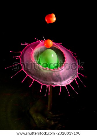 Liquid Droplet Collision Photographs with different type of shapes and designs including Umbrella, Mushroom, Abstracts, various shapes. This type of photography is done with   electronic device.
