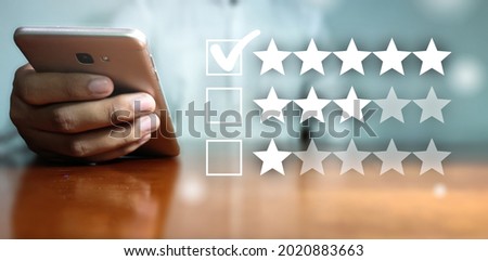 Customer Experience Concept, Best Excellent Services Rating for Satisfaction present by hand of Client pressing Five Star
