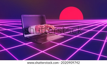 Male hands from laptop screen type on keyboard. Remote manager, online work or education. Minimal internet vaporwave concept. Purple background with sun and neon grid. Abstract retrowave surrealism. Royalty-Free Stock Photo #2020909742