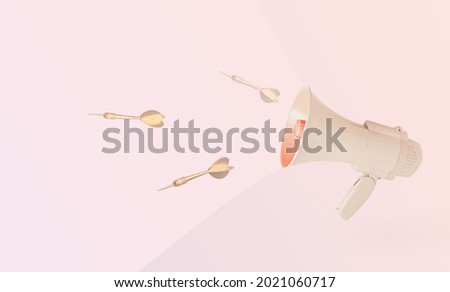 Golden arrows and beige megaphone on pastel pink background. Minimal abstract creative concept of public political speakers, hate speech, shouts, fake news, disparage or hurtful words. Royalty-Free Stock Photo #2021060717