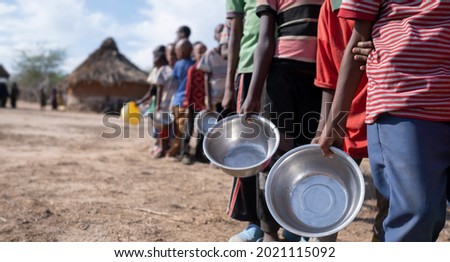 children waiting in line for food delivery Royalty-Free Stock Photo #2021115092
