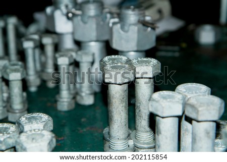 Steel bolts & nuts in warehouse