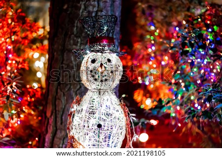 Snowman light  Christmas decoration outdoors.