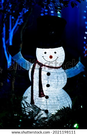 Snowman light  Christmas decoration outdoors.
