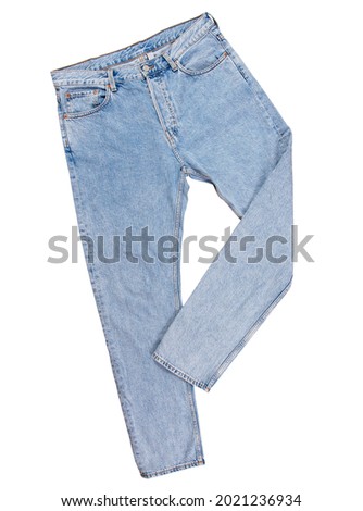 Denim pants isolated, blue folded jeans isolated on white background close up Royalty-Free Stock Photo #2021236934