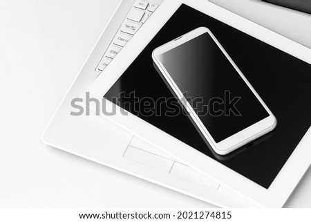 Digital devices (laptops, smartphones and tablets)