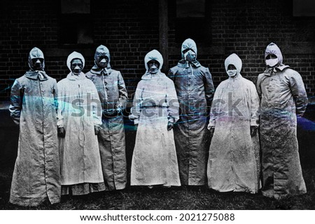 People in protective suits from the Spanish flu epidemic coronavirus contaminated background Royalty-Free Stock Photo #2021275088