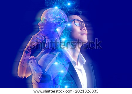 Business investment and metaverse AI artificial intelligence data analysis technology. Businessman and robot future investor, stock market, forex, and crypto currency NFT game finance investment.  Royalty-Free Stock Photo #2021326835