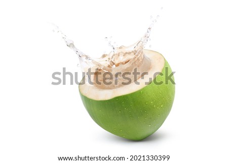 Coconut juice splashing isolated on white background. Royalty-Free Stock Photo #2021330399