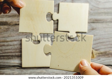 puzzle.Business woman hands connecting jigsaw puzzle. Business solutions, 