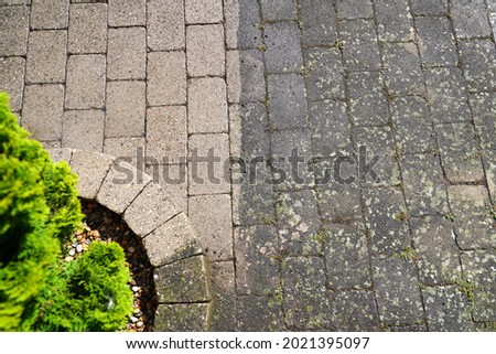  High pressure water cleaning . Before and efter.  Royalty-Free Stock Photo #2021395097