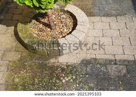  High pressure water cleaning . Before and efter.  Royalty-Free Stock Photo #2021395103