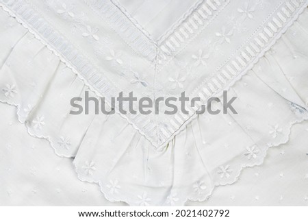 background of white embroidered fabrics, decorative lace