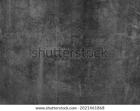 Black and white background, rough texture, looks like a cement floor for background or advertising text.
