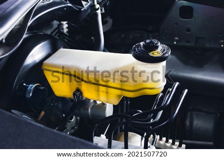 Brake fluid reservoir and brake booster of the car Royalty-Free Stock Photo #2021507720