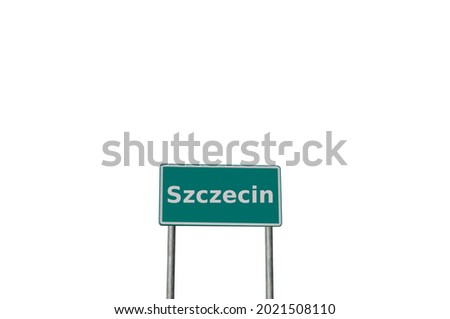 Green city board on a pole with the inscription Szczecin, Polish city isolated on a white background