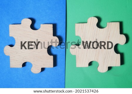 Pieces of puzzle with Key and Word wording.