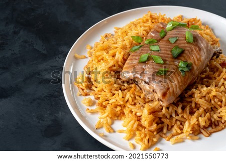 Machboos a is Bahrain's national dish and a typical dish of the Persian Gulf cuisine. Cooking fish with rice and spices, ideally combining all flavors and spices. Royalty-Free Stock Photo #2021550773