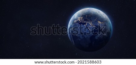 Planet Earth at night. City lights and blue sphere. Wide space wallpaper. Elements of this image furnished by NASA Royalty-Free Stock Photo #2021588603
