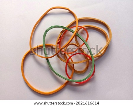 some colorful rubber bands. white background