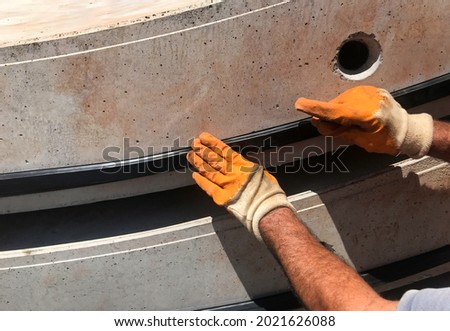 Rubber seals are applied to Concrete Tunnel segments. Royalty-Free Stock Photo #2021626088