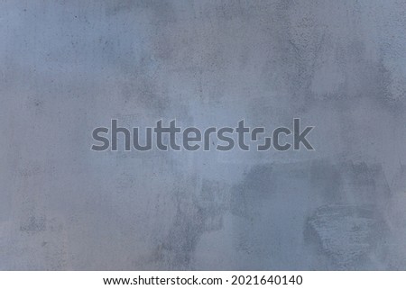 Gray painted metal. Rough textured surface. Background for blank or graphic resource for design