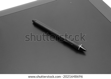 Graphic tablet closeup with pen on white background