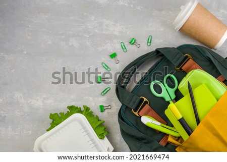 Stay safe. Lunch box, school and office supplies on a light background. Back to school concept. Social distance, learning and home education. Top view. Copy space.