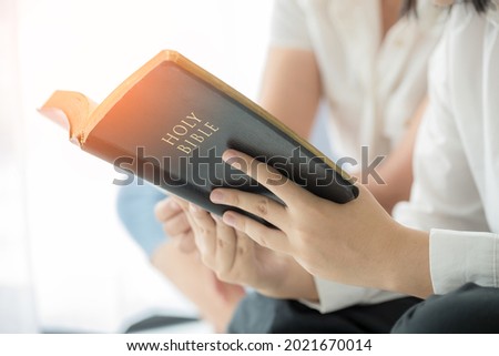 Christian small group praying together in homeroom, devotional or prayer meeting concept Royalty-Free Stock Photo #2021670014