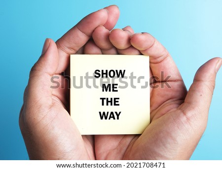 Selective focus of show me the way word on notepad with hand insight