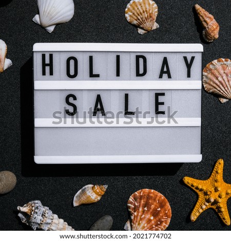 Lightbox with text HOLIDAY SALE, summer decorations Sale shopping concept. Mockup summer promotion advertising. Holiday. Sea shell stars. Online shopping