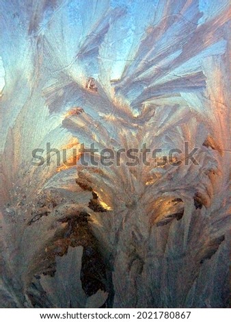Frozen noisy window on the cold winter. High quality photo. No focus Royalty-Free Stock Photo #2021780867