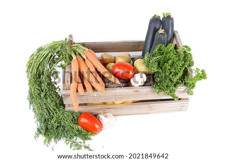 box of vegetables isolated on white