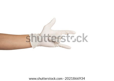 Close up of I love you hand sign wearing white rubber gloves with white background.