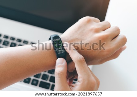 Hands with heart icons, Smartwatch on hand