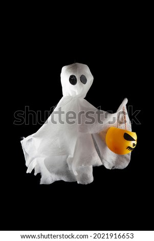 Decorative background for Halloween, white ghosts with pumpkins