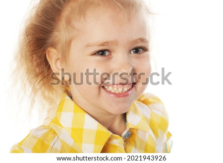 cute laughing girl child over white background, happy childhood, close up picture