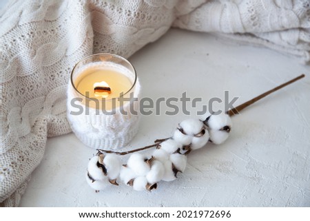 Spa relax background with candles and cotton, autumn mood, white cute picture, cosy autumn background

