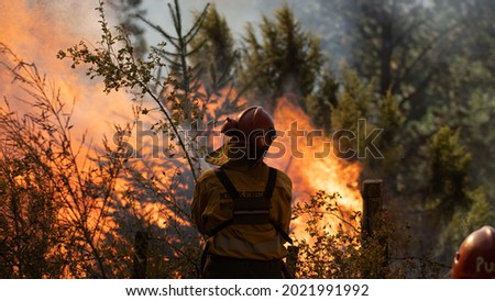 Fire Fighter in Patagonia Argentina, People work
