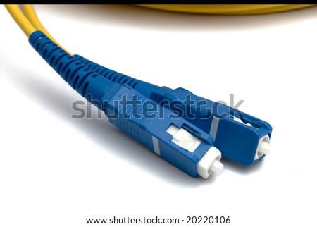 two optical plugs of dark blue color sc on a white background it is isolated