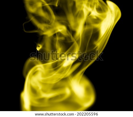 yellow smoke on a black background